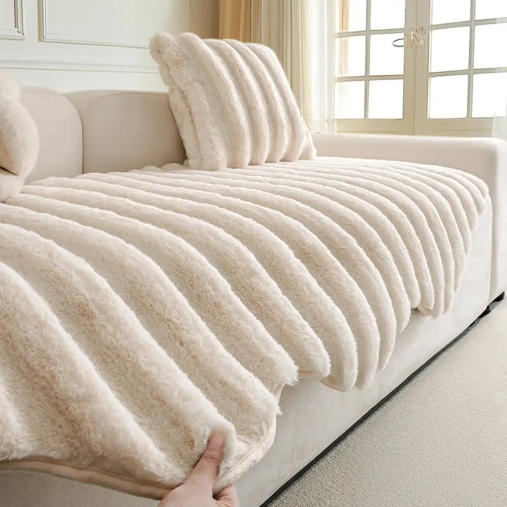 Stylish plush furniture protector, enhancing living room decor while protecting the sofa.