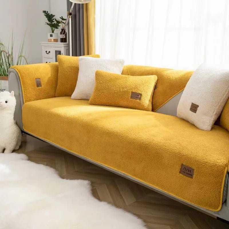 Super soft plush sofa cover for maximum coziness and complete furniture protection.