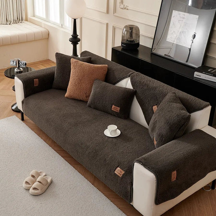 Multi-functional plush sofa cover, a stylish and practical solution for warmth and furniture care.