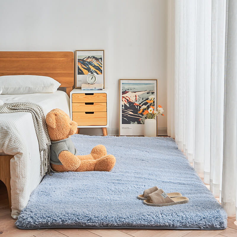 Close-up of fluffy white shaggy area rug, soft non-slip bedroom carpet for cozy home decor.