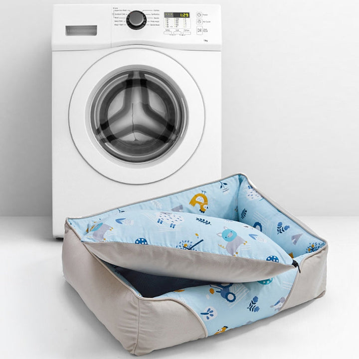 Comfortable dog bed with a high neck guard, suitable for all dog sizes.