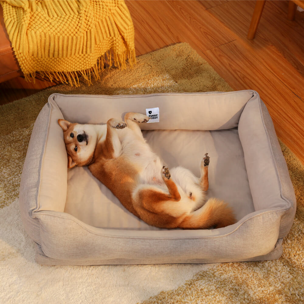 Washable square dog bed with 'bread' design, soft and plush for pets.