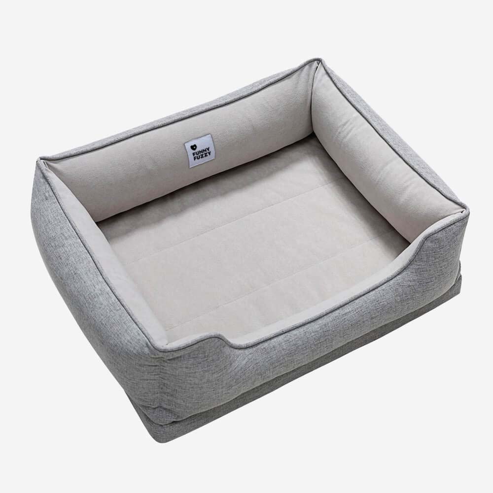 Plush square dog bed in 'bread' style, ensures pet comfort and warmth.