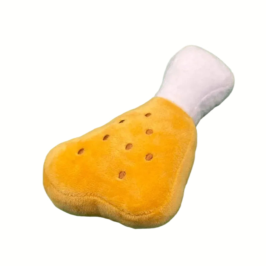 Yellow grilled cheese sandwich plush squeaky dog toy, a cozy playtime companion.