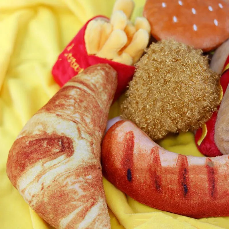Cartoonish blue ice cream cone plush squeaky dog toy, an interactive pet supply.