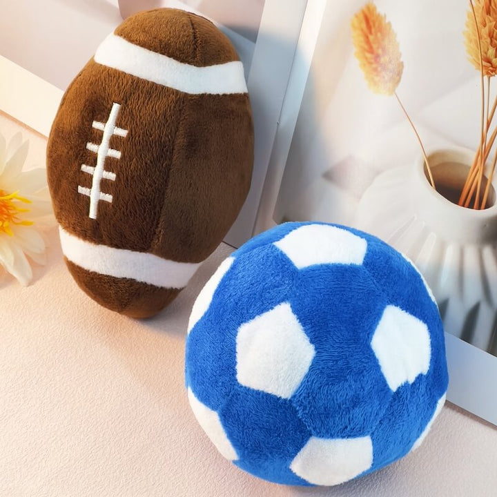Plush squeaky dog toy shaped like a football for interactive play and dental health.