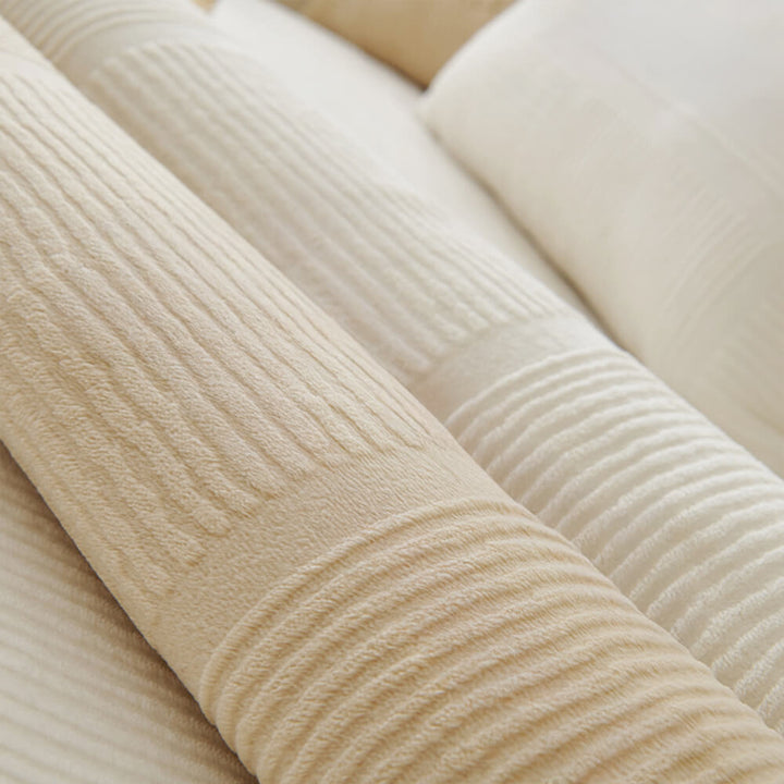 Various color options for plush striped square couch covers, enhancing home decor.