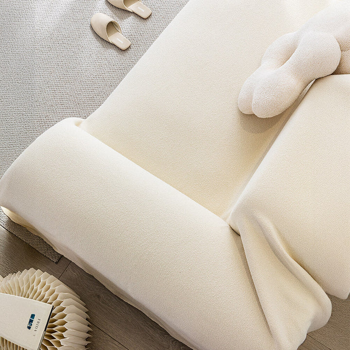 Close-up of soft teddy plush texture on a waterproof furniture protector for sofas