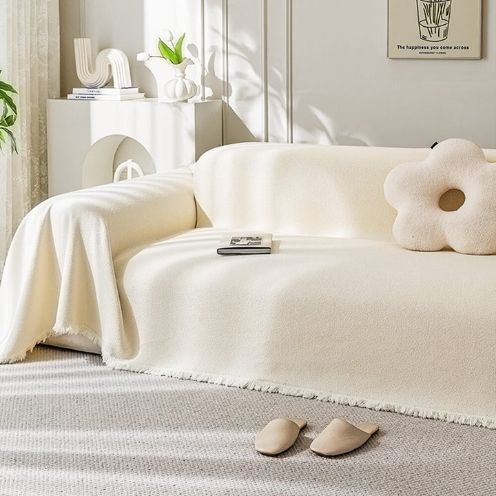 Unisex teddy plush couch cover safeguarding a sofa from pet spills and wear