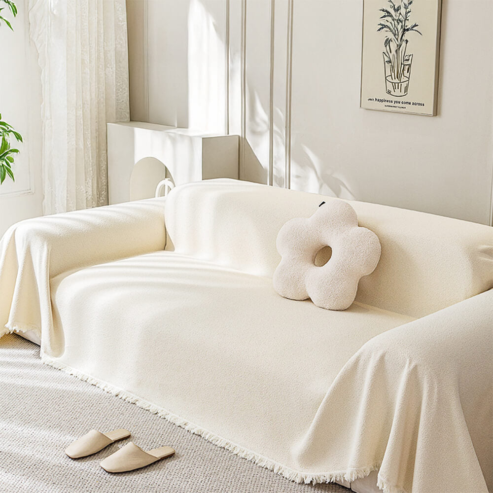 Detail shot of the durable, water-resistant material of the teddy plush sofa cover