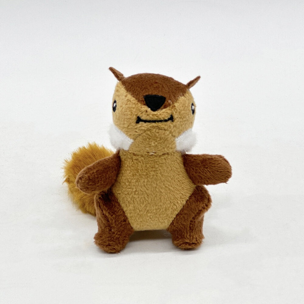 Detailed view of the soft, durable plush tree trunk dog toy with three fluffy squeaky squirrel inserts