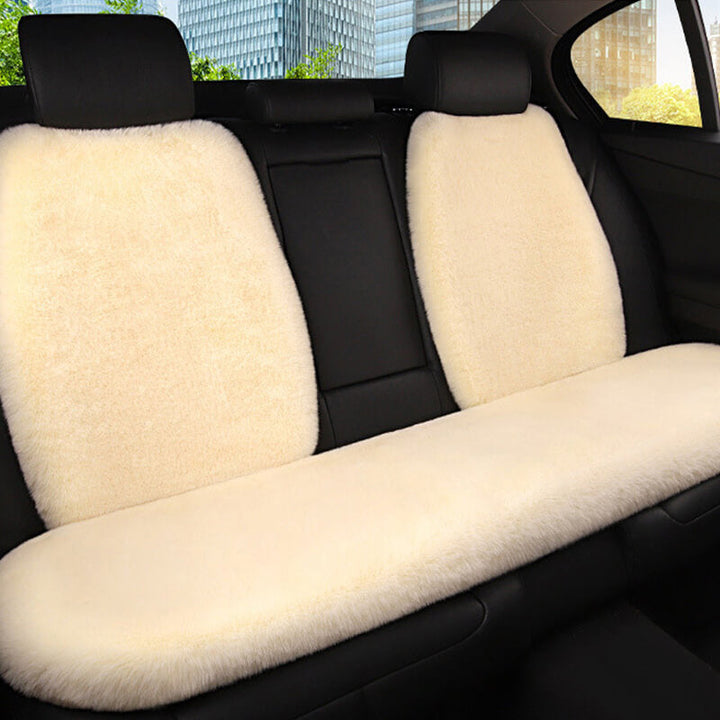 Universal plush pet car seat protector, ideal for keeping vehicle interiors clean and dogs comfy.