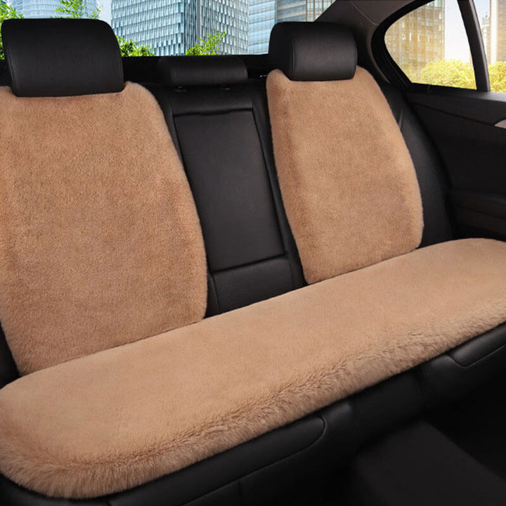 Car seat cover for pets, plush and universal, shown folded for storage, an auto travel accessory.
