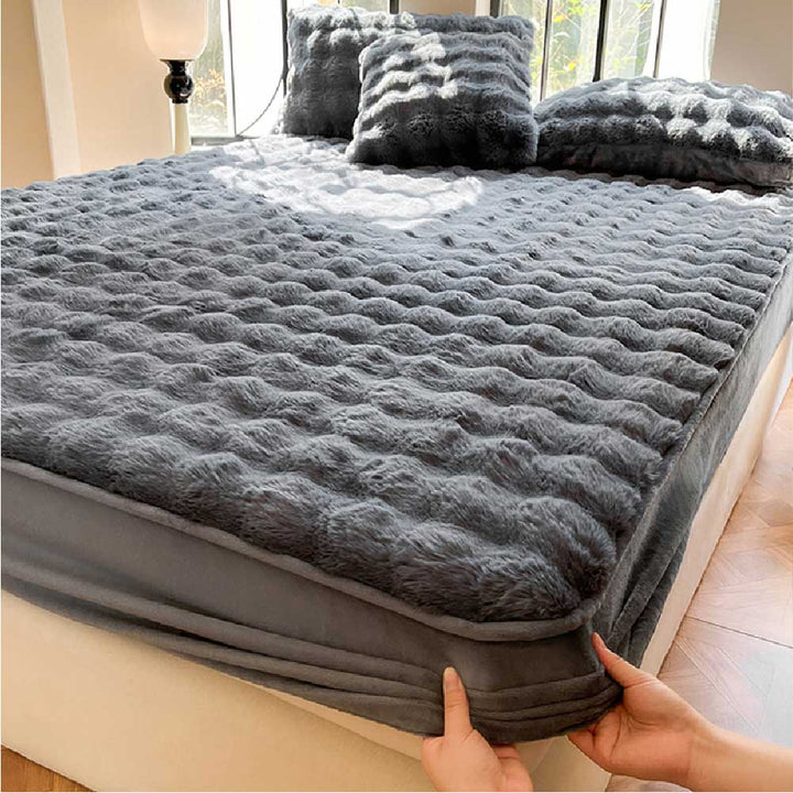 Pet hair resistant plush velvet fitted sheet and pillowcases, adding warmth and style to any bedroom.