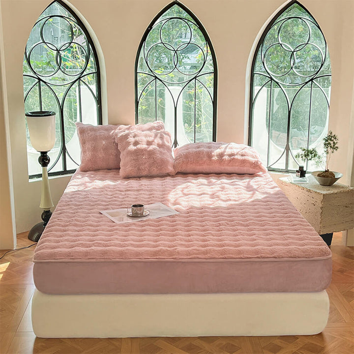 Comfortable plush fitted sheet and two pillowcases, ideal for a cozy, pet hair resistant bedroom environment.