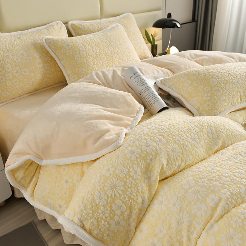 Pillow shams from a velvet floral carved bedding set, adding elegance to any bedroom