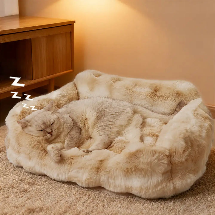 Luxury plush velvet dog bed with bolster, providing a comfortable and washable pet furniture solution