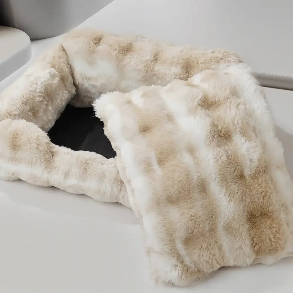 Plush velvet animal bed with raised edges, offering a secure and soft spot for pets to sleep