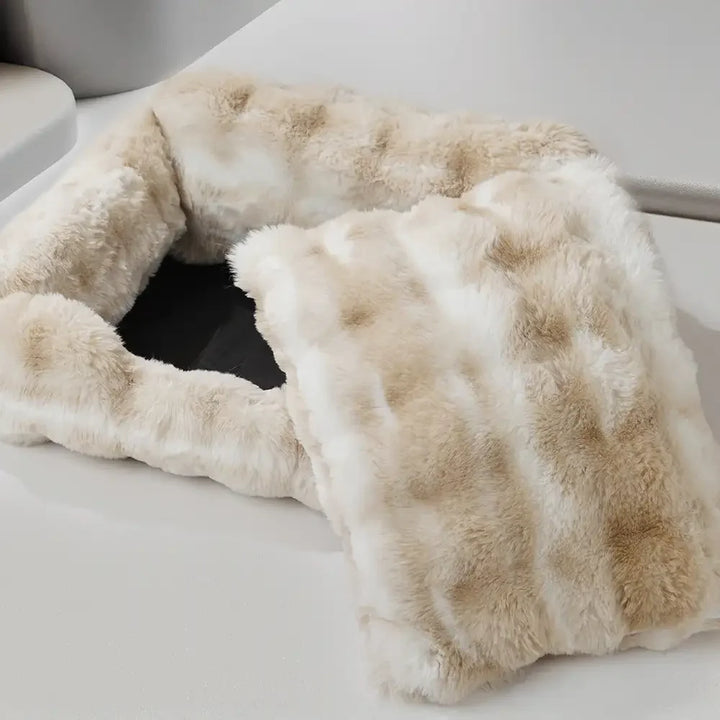 Plush velvet animal bed with raised edges, offering a secure and soft spot for pets to sleep