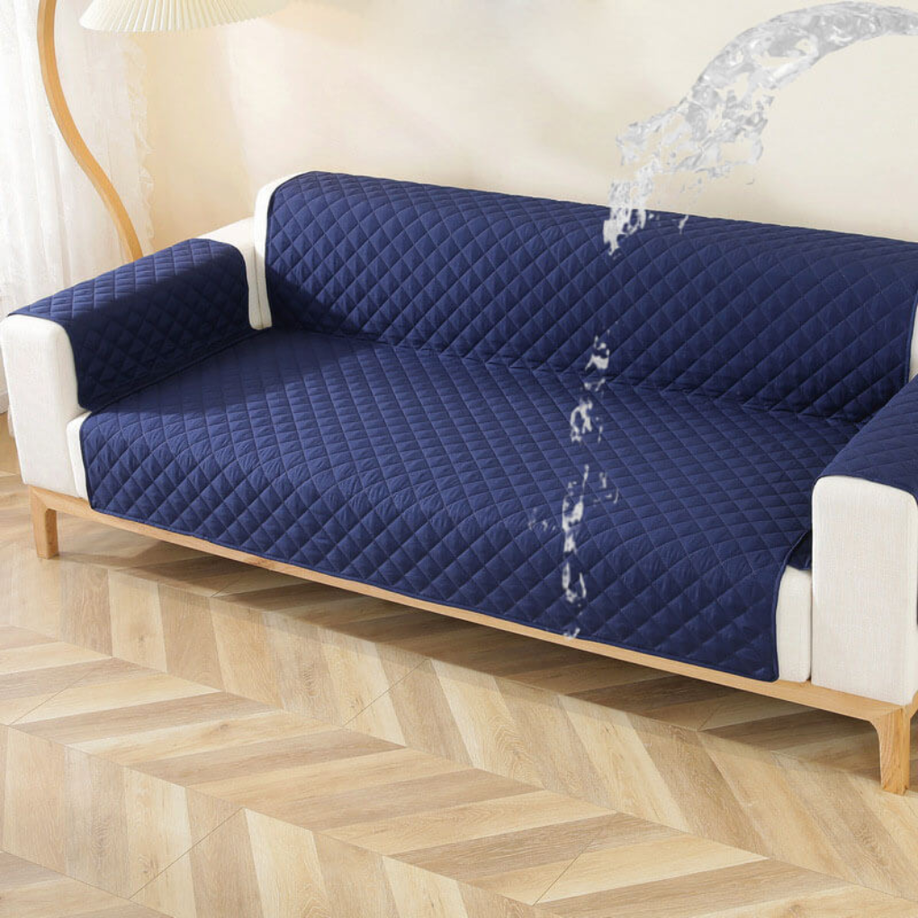 Corner view of a sofa draped with a pet-friendly, non-slip velvet waterproof couch cover.