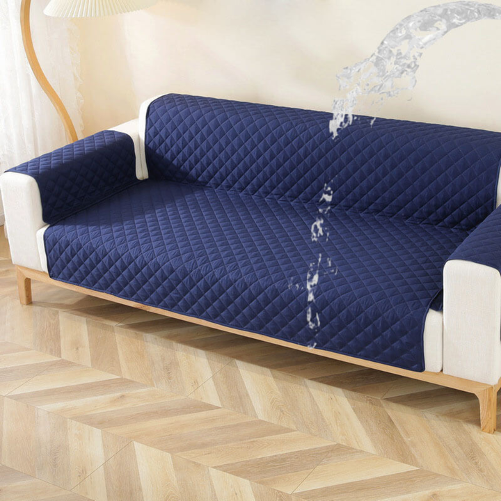 Corner view of a sofa draped with a pet-friendly, non-slip velvet waterproof couch cover.