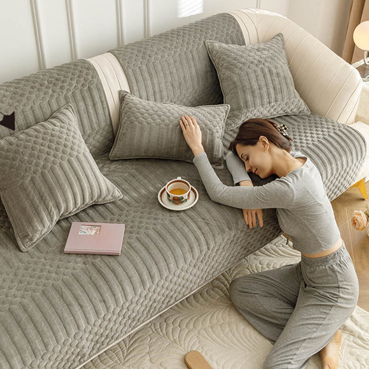 Sectional plush vintage couch cover with non-slip grip, protecting all cushions