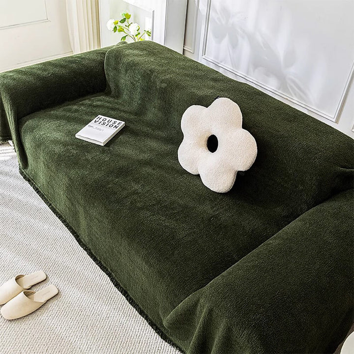 Full view of a three-seater sofa with a plush water-resistant slipcover, offering furniture protection.