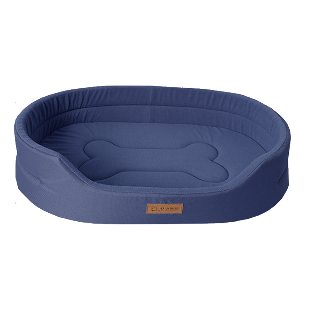 Happy dog relaxing on a plush waterproof pet bed. Easy clean, comfy design.