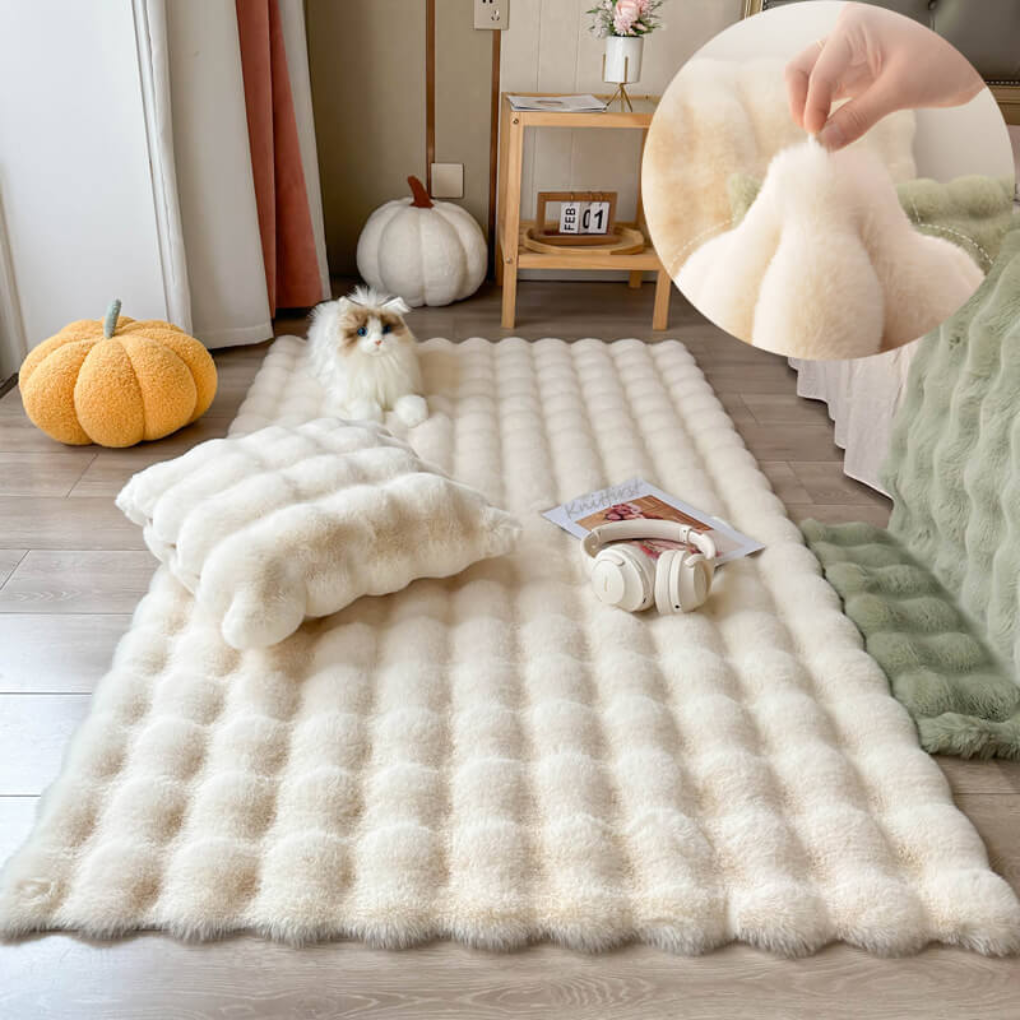 Luxurious faux fur sheepskin rug in off-white, ideal for bedroom plush comfort