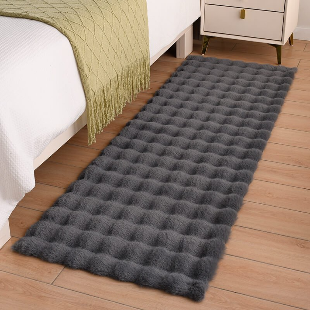 Elegant plush faux sheepskin rug in white, durable and soft for high-traffic areas
