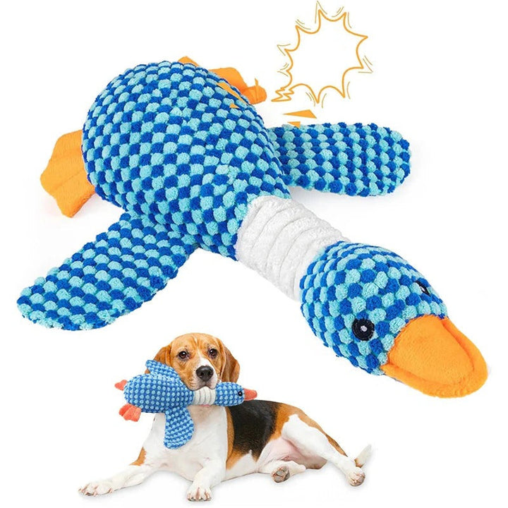 Plush yellow duck dog chew toy with squeaker for interactive puppy playtime