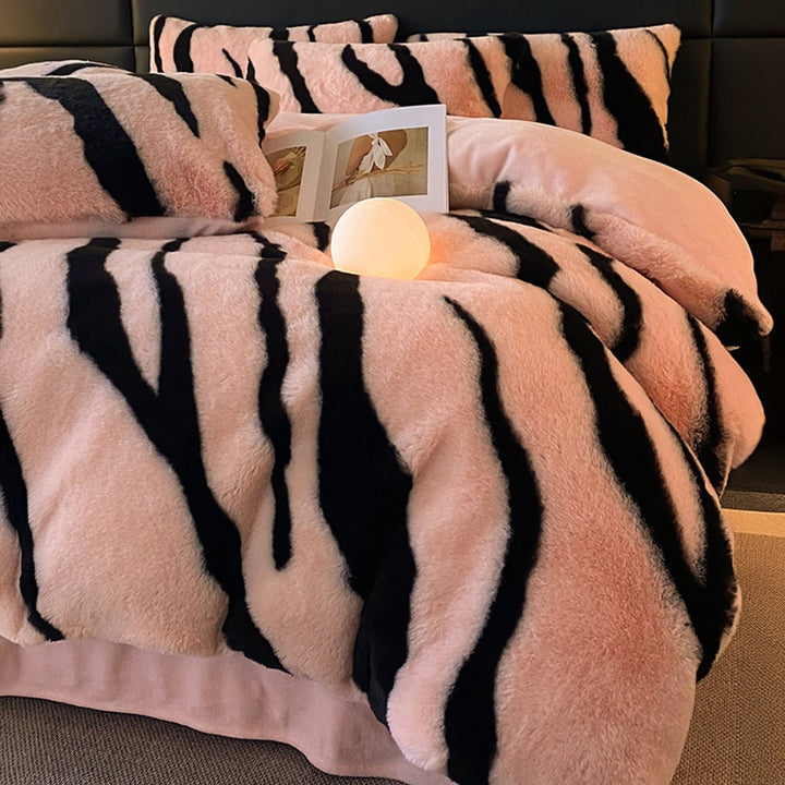 Cozy and warm zebra print faux fur bedding ensemble, providing ultimate comfort and home decor