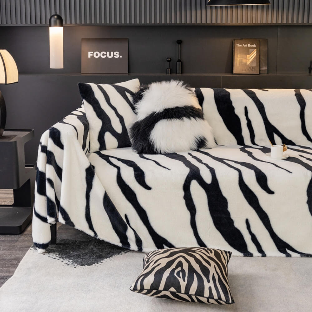 Elegant zebra print plush sofa cover, enhancing living room with pet-friendly design