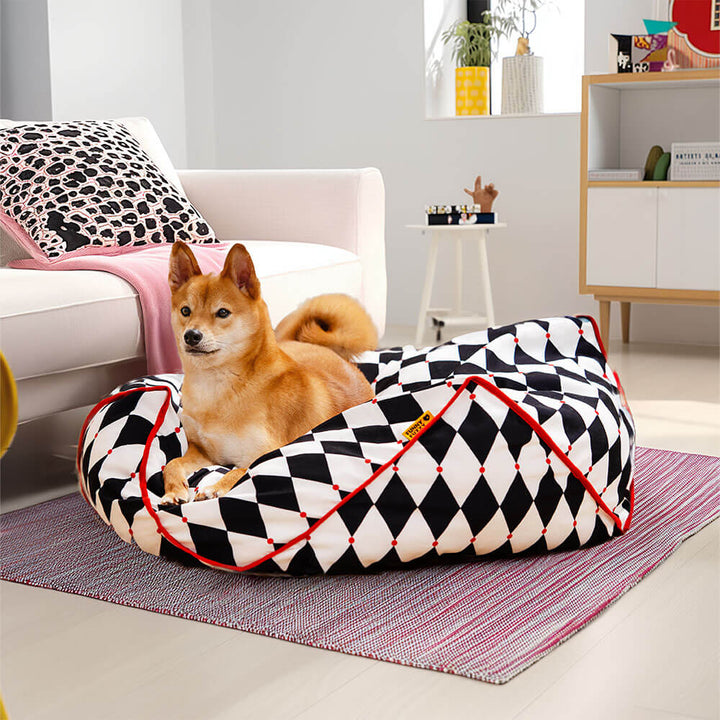 Geometric pet calming bed, polygonal bean bag style, soft and durable for dogs & cats.