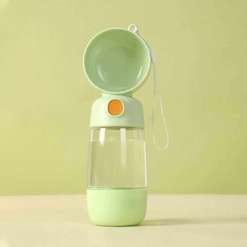 Durable leak-proof dog water bottle and pet feeder, designed for ease of use during outdoor adventures.