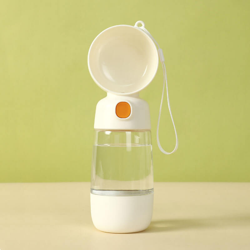 Ergonomic 2-in-1 portable dog water bottle with food compartment, making pet travel effortless.