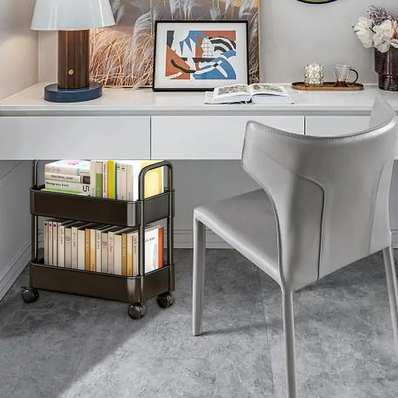 Modern 2-tier rolling bookshelf cart. Stylish mobile storage for any room: home office, bedroom, or living area.