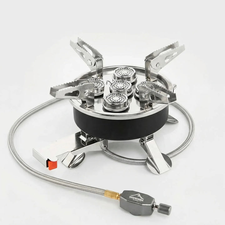 Compact 4-burner portable gas stove, ideal for camping, hiking, and backpacking outdoor cooking.
