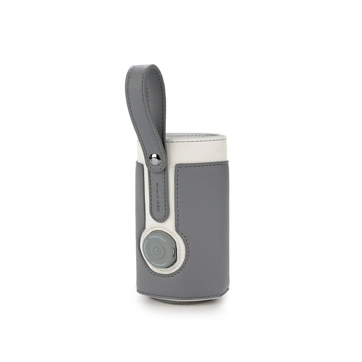 Portable baby bottle warmer, ideal for car, stroller, or airplane travel, keeping baby's milk warm.