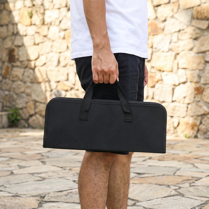 Giftable portable grilling tools: stainless steel BBQ set in a travel case for outdoor cooking enthusiasts.