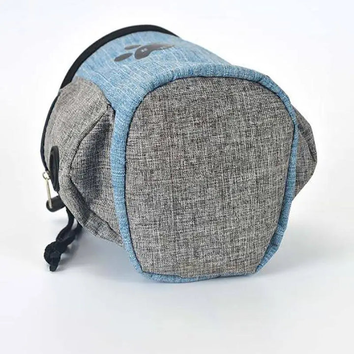 Dog walking accessory: a durable, portable waste bag dispenser, perfect for outdoor pet care.