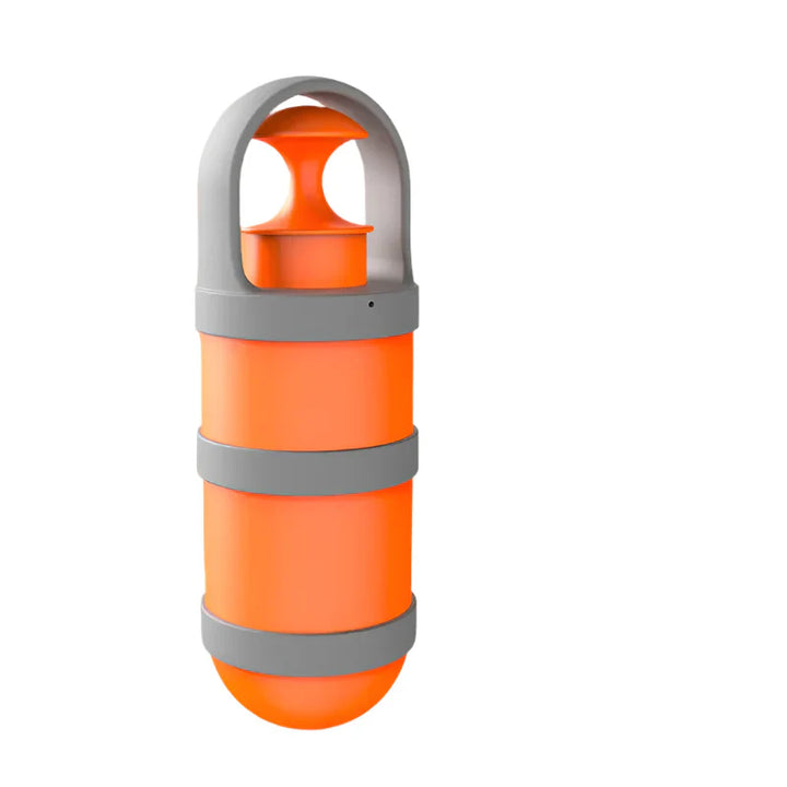Compact dog waste picker and dispenser, essential outdoor pet gear for easy poop scooping.