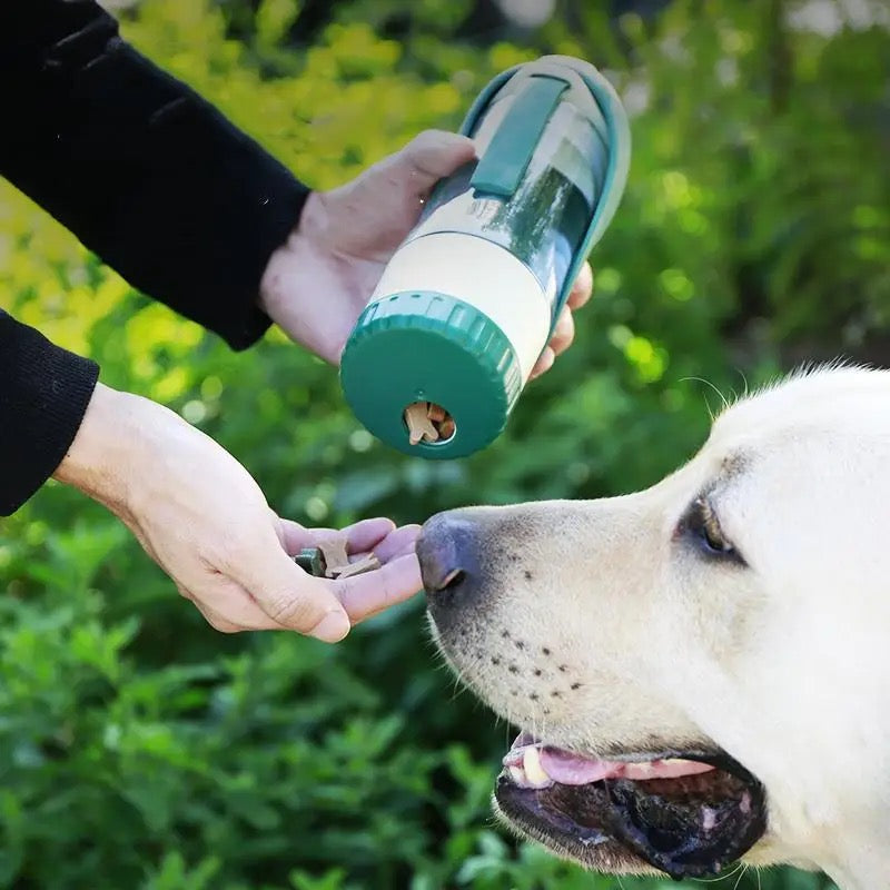 Compact pet travel bottle for water and snacks, perfect for dogs on walks or outdoor adventures.