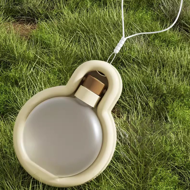 Outdoor dog gear: a portable water bottle that doubles as a feeder for convenient pet travel.