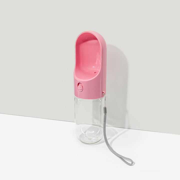 Pet travel bottle, durable plastic, provides fresh water for your dog anywhere.