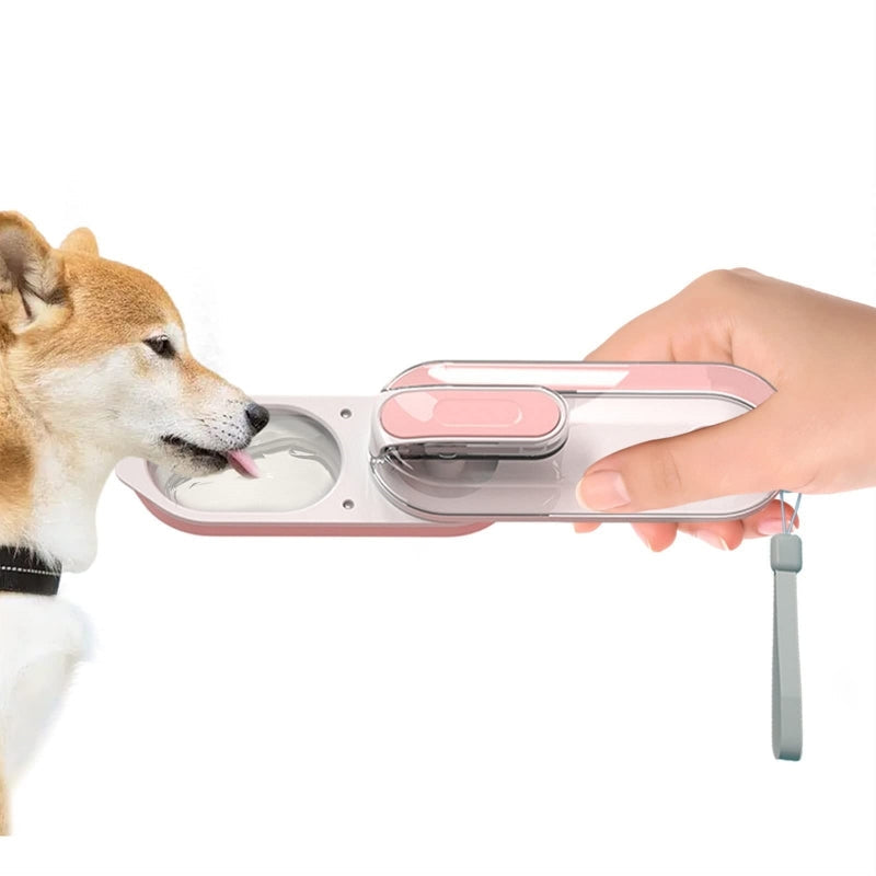 Blue portable dog water bottle with a handy built-in bowl, essential pet travel gear for hydration.