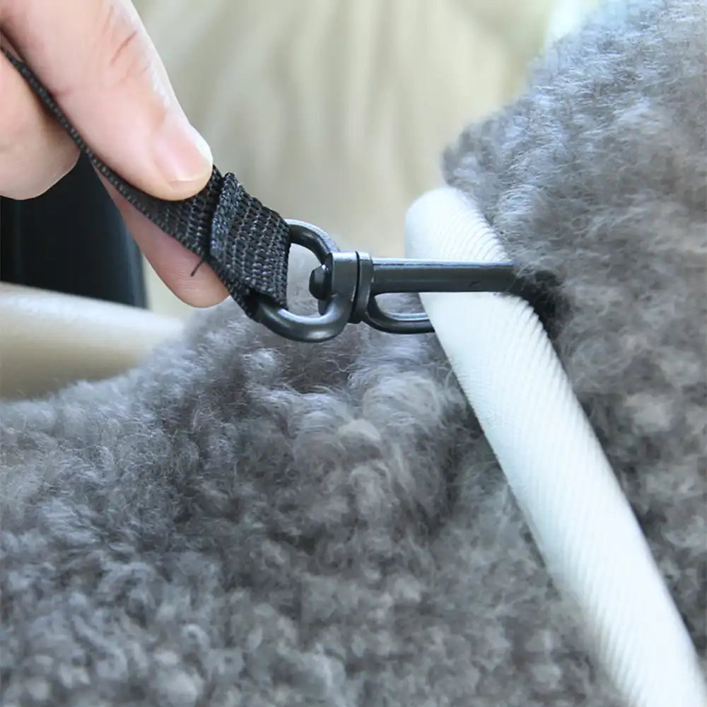 Portable dog car seat made of waterproof faux leather for pet safety on trips