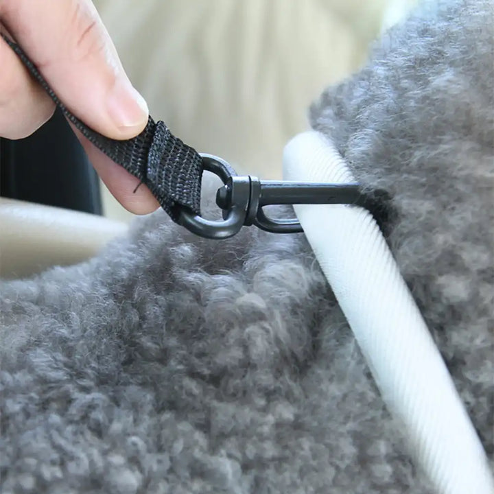 Portable dog car seat made of waterproof faux leather for pet safety on trips