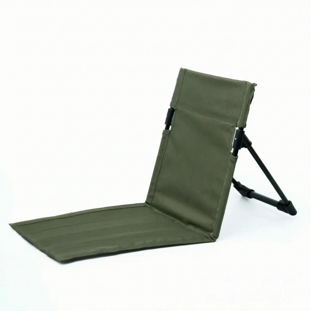 Ergonomic portable folding floor chair, providing comfortable ground seating for outdoor activities like fishing or festivals.