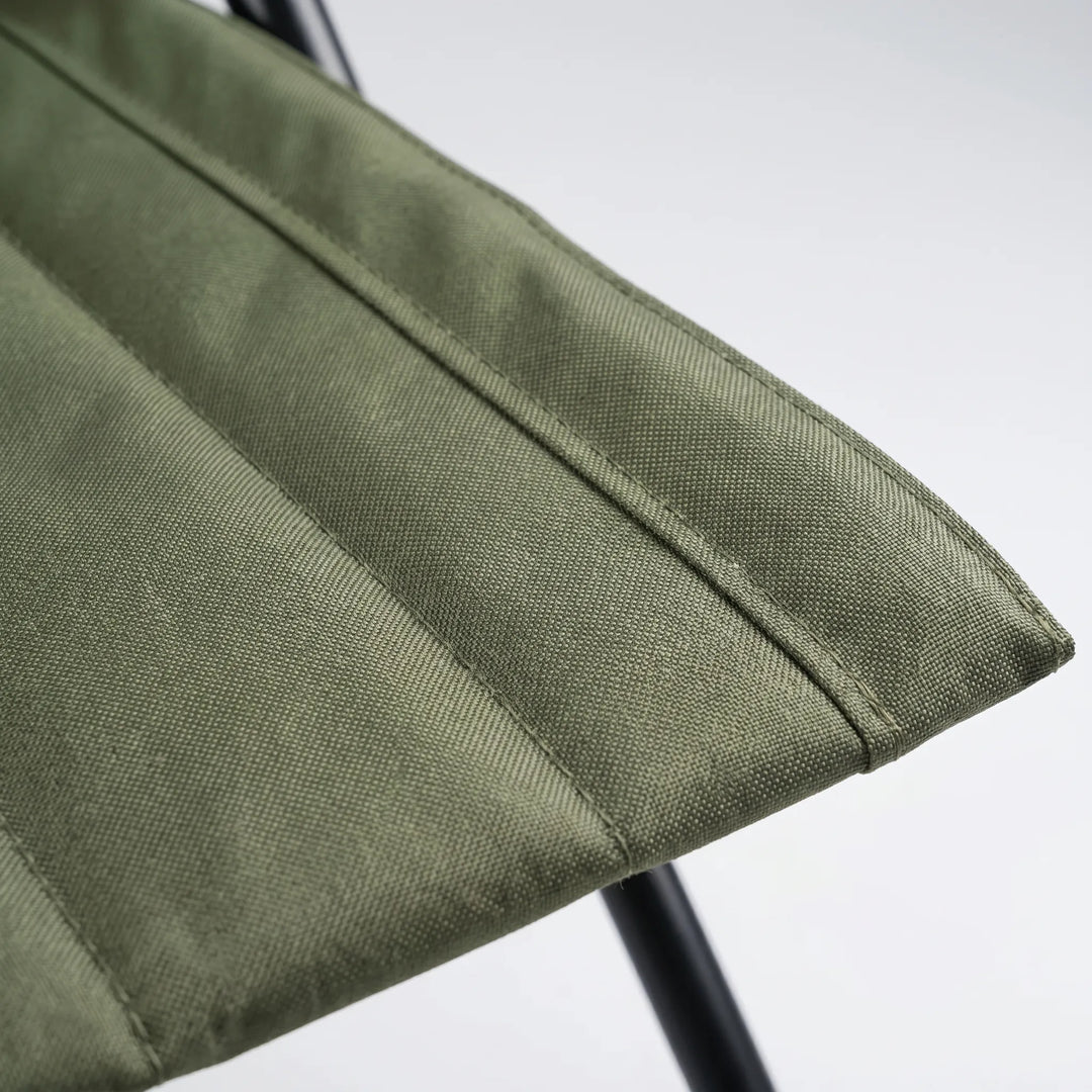 Compact stadium seat for outdoor events. Portable ground chair provides comfortable seating at games & concerts.